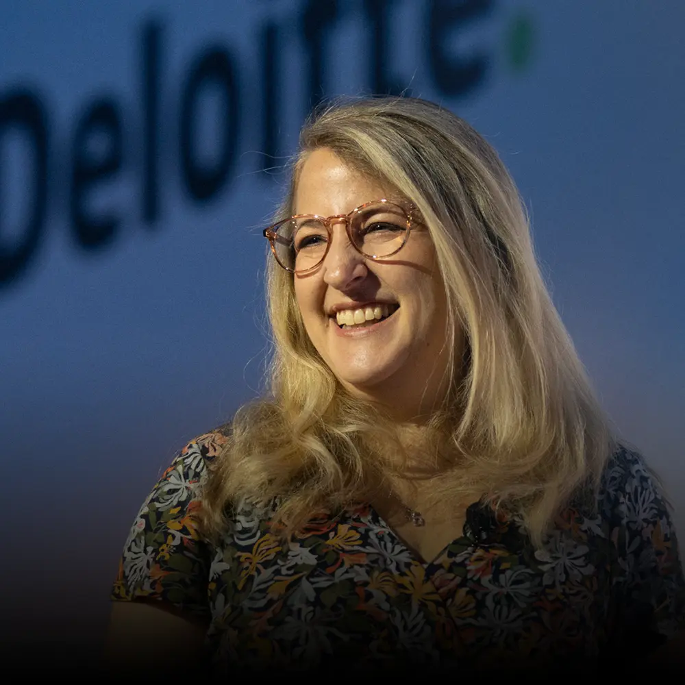 Alexis Lambert on stage at a event for one of the 'big four'.